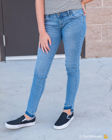 Tractr Girls Skinny Jeans with Asymmetrical Detailed Hem - LuxNovaHub 